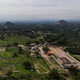 The construction site, shown in context with Teotihuacan in the background. Upwards of 25 unexplored structures are believed to exist on this protected land.